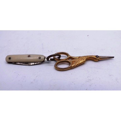 573 - VINTAGE MINIATURE BRASS CRANE SEWING SCISSORS AND PENKNIFE