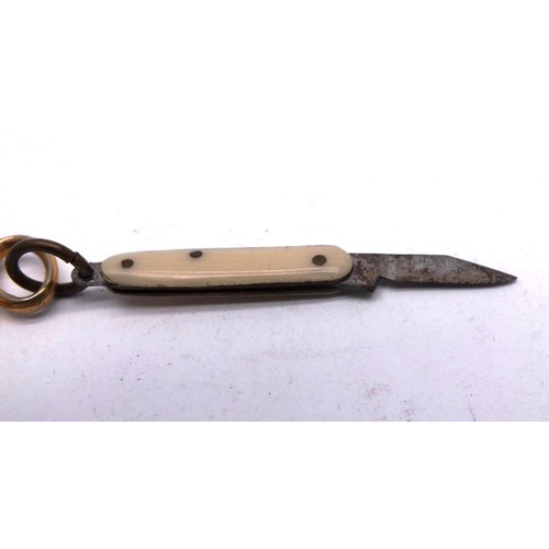 573 - VINTAGE MINIATURE BRASS CRANE SEWING SCISSORS AND PENKNIFE