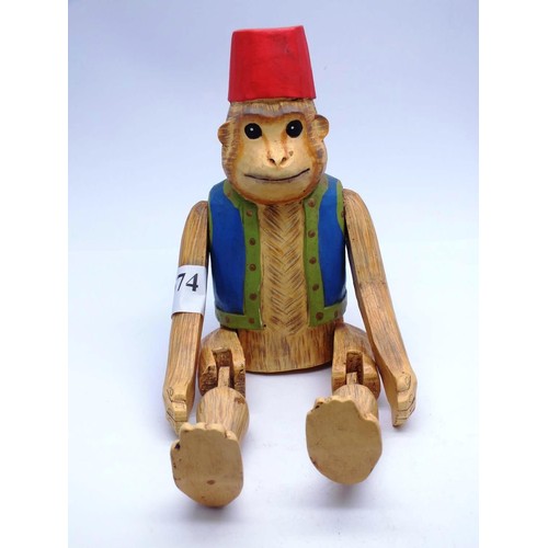 574 - VINTAGE HAND CARVED BELL BOY ARTICULATED MONKEY 12