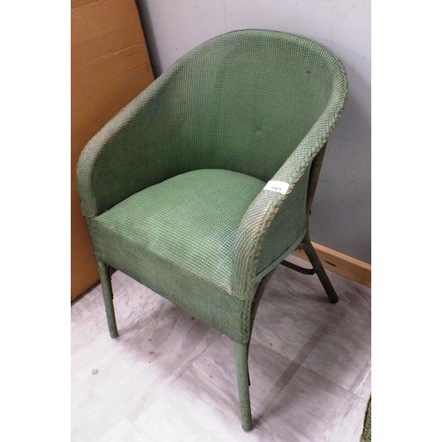 589 - TWO GREEN WICKER CHAIRS