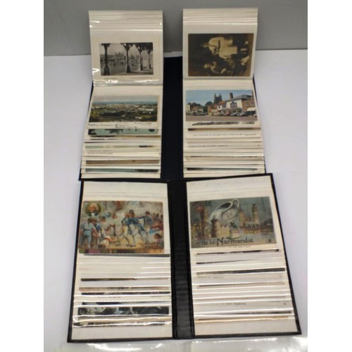 308 - THREE ALBUMS OF POSTCARDS AND PHOTO'S