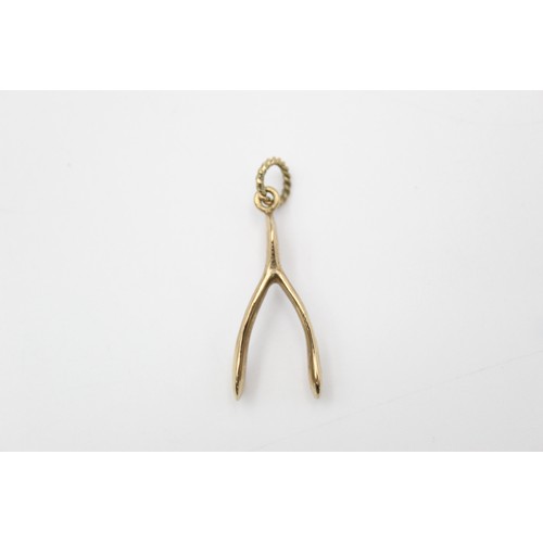 58 - 9ct Gold wishbone pendant (3g)