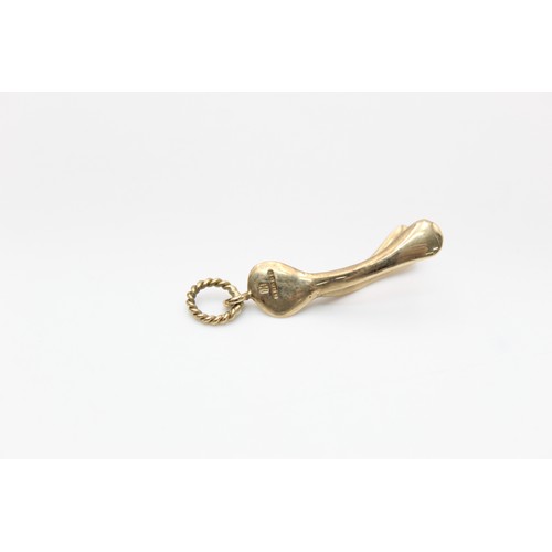 58 - 9ct Gold wishbone pendant (3g)