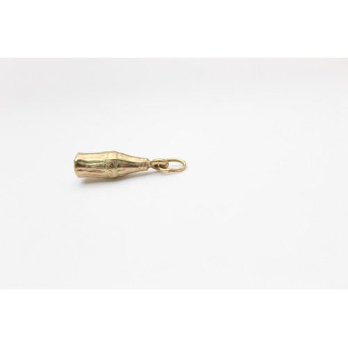 78 - 9ct Gold Coca Cola bottle pendant (0.5g)