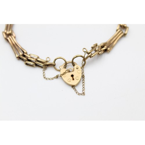 50 - 9ct Gold gate bracelet with heart padlock (5.1g)