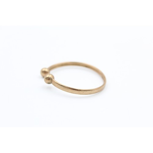 98 - 9ct Gold childs torque bangle (1.7g)