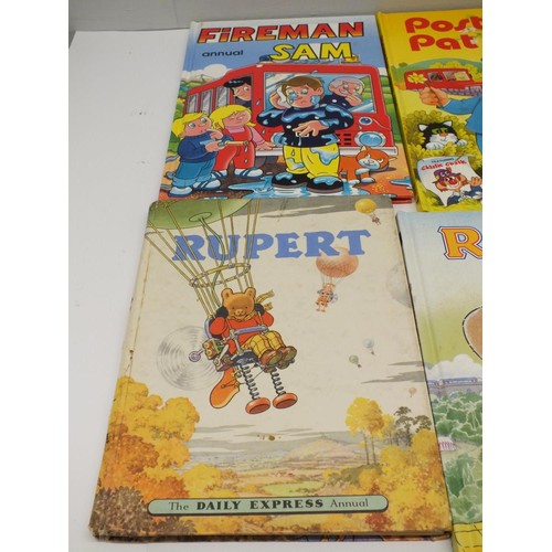 387 - SIX VINTAGE CHILDRENS ANNUALS INCLUDES THREE RUPERT