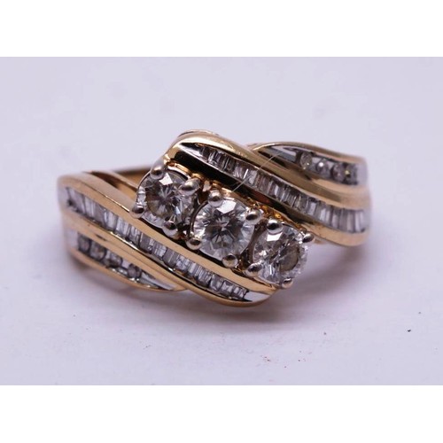 422 - 14K GOLD DIAMOND RING WITH 3 MAIN DIAMONDS & 32 BAGUETTE CUT DIAMONDS 4.2g SIZE N