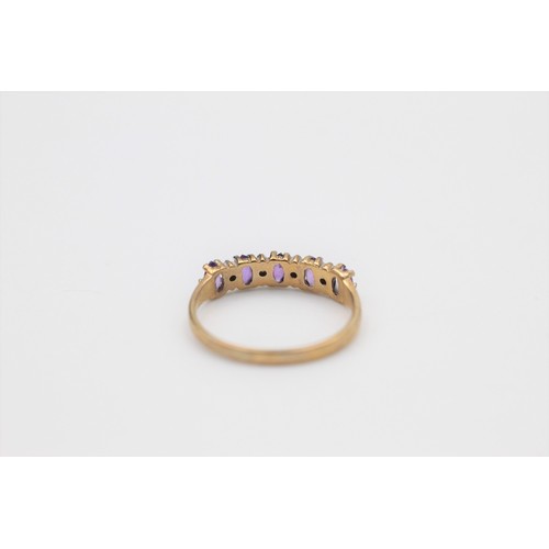 157 - 9ct gold amethyst and diamond half eternity ring (1.3g)