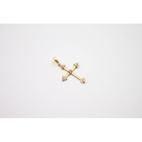 148 - 14ct gold diamond cross pendant (0.7g)