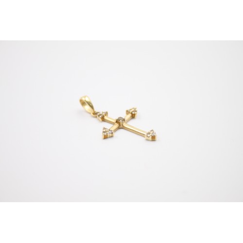 148 - 14ct gold diamond cross pendant (0.7g)