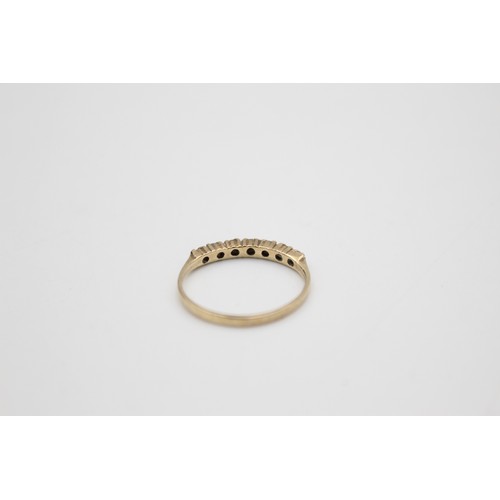 241 - 9ct gold diamond half eternity ring (1g)