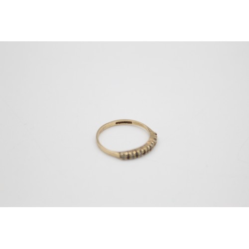 241 - 9ct gold diamond half eternity ring (1g)