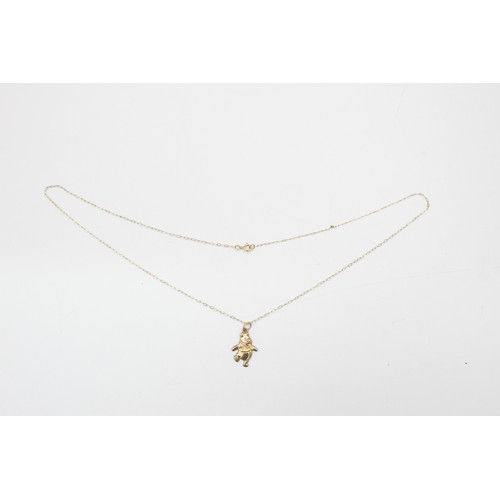 77 - 9ct gold pooh bear pendant necklace (0.5g)