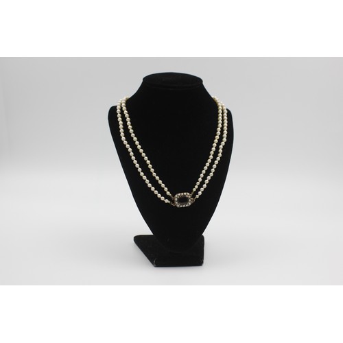 180 - 9ct gold garnet and pearl clasp double row pearl necklace (27g)