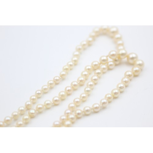 180 - 9ct gold garnet and pearl clasp double row pearl necklace (27g)