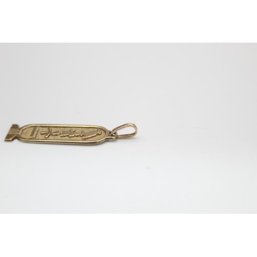 189 - 9ct gold egyptian revival pendant (1.4g)