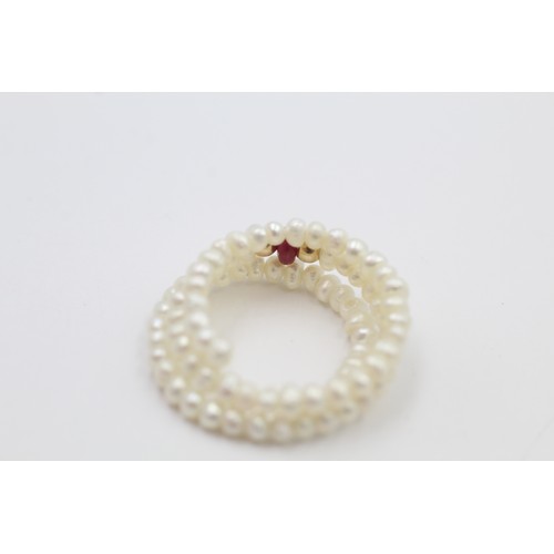 37 - 14ct gold ruby and pearl bead ring (2.4g)