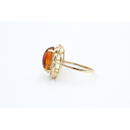 237 - 9ct gold vintage amber celtic braid setting dress ring (2.3g)  SIZE P