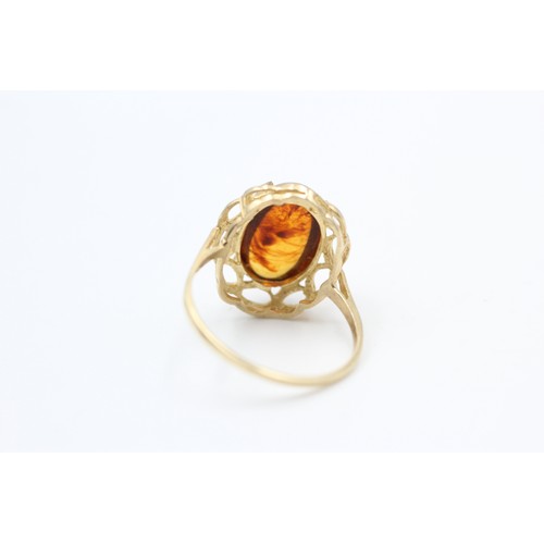 237 - 9ct gold vintage amber celtic braid setting dress ring (2.3g)  SIZE P