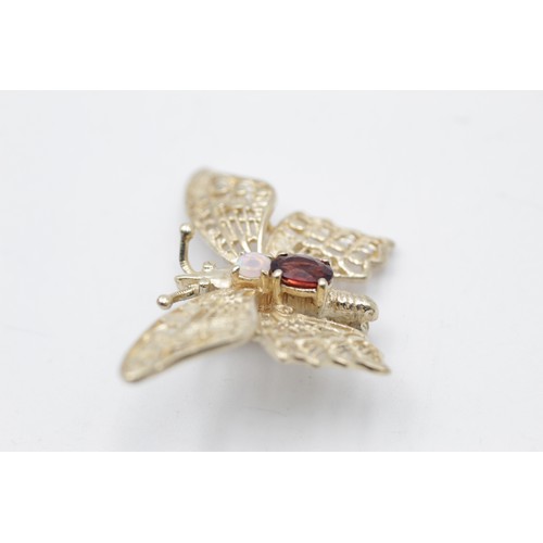 257 - 9ct gold opal & garnet filigree butterfly brooch (5.4g)