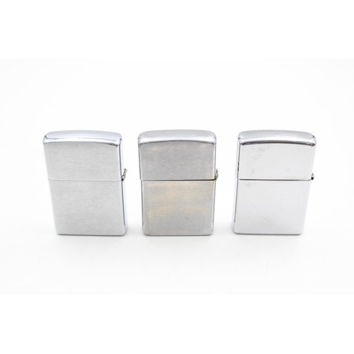153 - 3 x Assorted ZIPPO Lighters Inc Brushed Steel, Advertising, Australia Etc