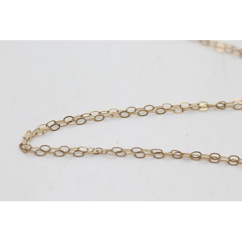 63 - 9ct gold robber mask pendant necklace (0.8g)