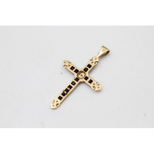 66 - 9ct gold diamond & sapphire cross pendant (1.3g)