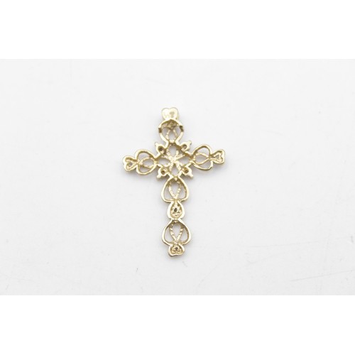 72 - 9ct gold diamond set openwork cross pendant (1.6g)