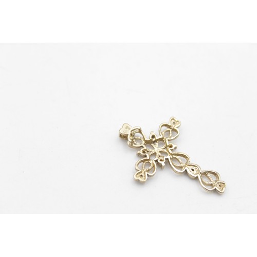 72 - 9ct gold diamond set openwork cross pendant (1.6g)