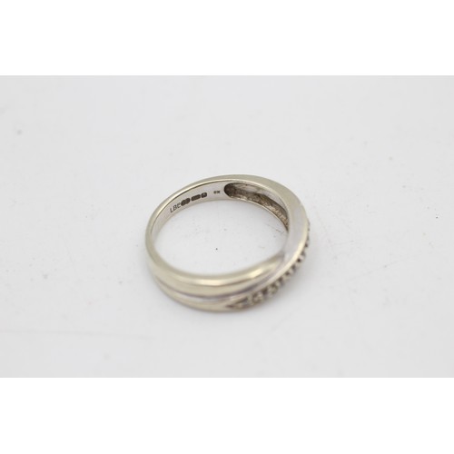 99 - 9ct white gold diamond crossover ring (2.5g) SIZE K