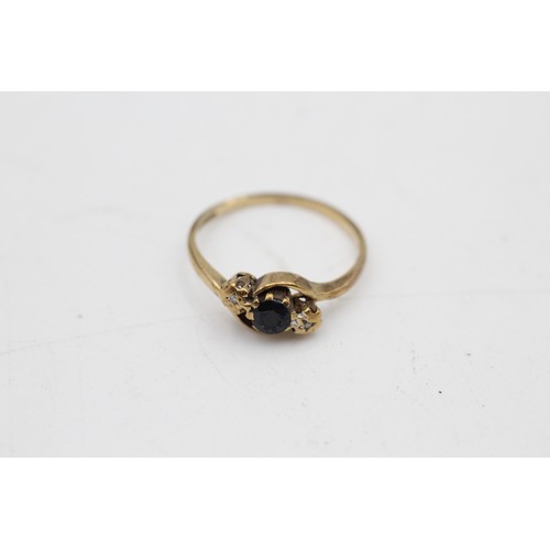 105 - 9ct gold diamond & sapphire three stone ring (1.6g)  SIZE O