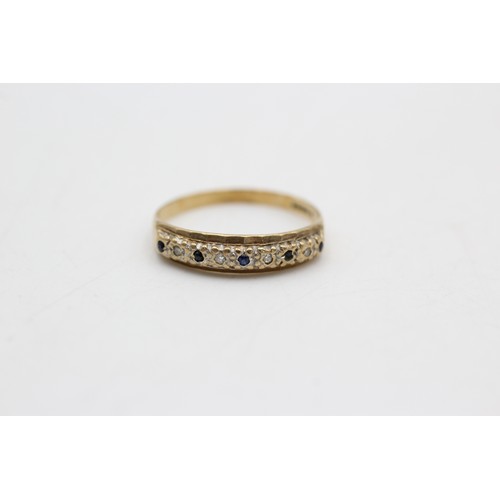 114 - 9ct gold vintage Sapphire & Diamond nine stone ring (1.5g) SIZE P
