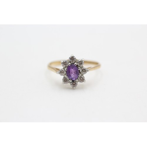 114 - 9ct gold amethyst & clear gemstone floral cluster ring (1.4g)  SIZE J