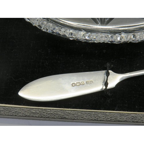 163 - TWO CUT GLASS BON BON DISHES WITH TWO SILVER MINIATURE KNIVES. SILVER WEIGHT 22g IN BOX. BOX AS FOUN... 