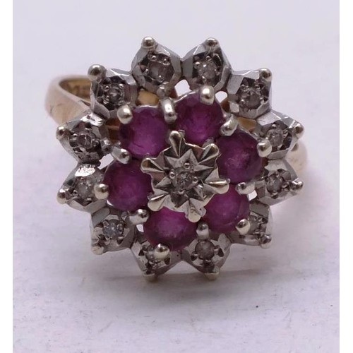 207 - 9CT GOLD RUBY AND DIAMOND CLUSTER RING  SIZE M, 4g