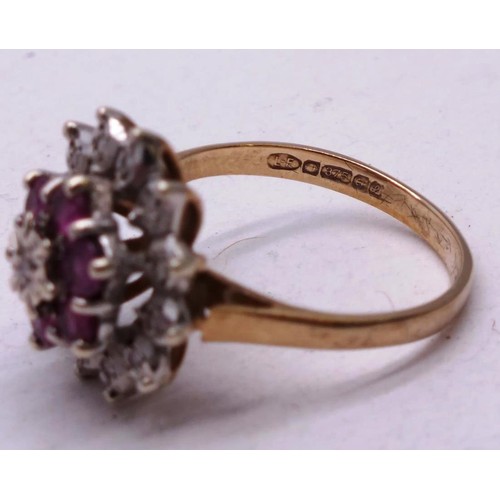 207 - 9CT GOLD RUBY AND DIAMOND CLUSTER RING  SIZE M, 4g