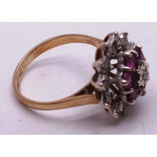 207 - 9CT GOLD RUBY AND DIAMOND CLUSTER RING  SIZE M, 4g