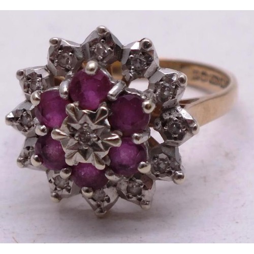 207 - 9CT GOLD RUBY AND DIAMOND CLUSTER RING  SIZE M, 4g