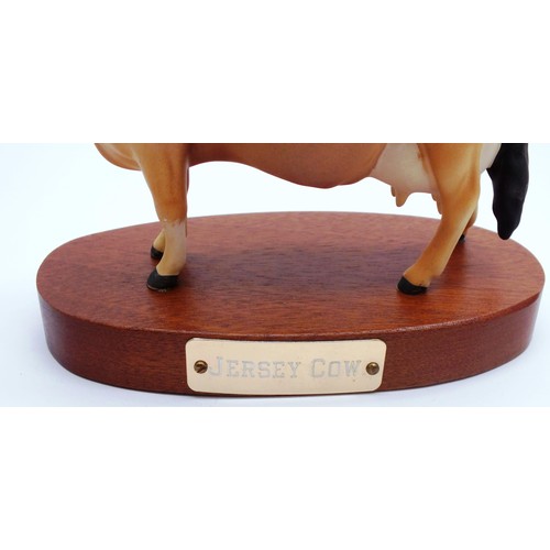 229 - RARE BOXED MATT JERSEY COW ON WOODEN PLINTH