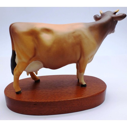 229 - RARE BOXED MATT JERSEY COW ON WOODEN PLINTH