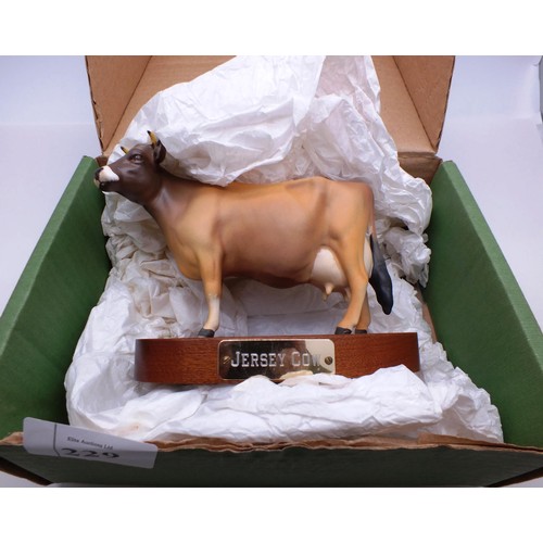 229 - RARE BOXED MATT JERSEY COW ON WOODEN PLINTH