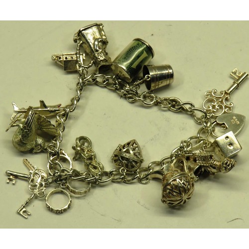 195 - VINTAGE STERLING SILVER CHARM BRACELET