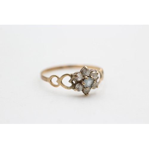 348 - 9ct gold aquamarine & clear gemstone cluster ring with cut out heart detail SIZE S, 1.2g