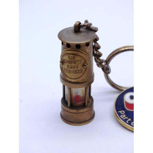 327 - VINTAGE BRASS DAVY MINERS LAMP KEYRING AND ENAMEL CPC PART OF BRITISH COAL FOB