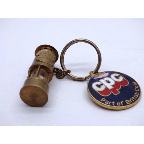 327 - VINTAGE BRASS DAVY MINERS LAMP KEYRING AND ENAMEL CPC PART OF BRITISH COAL FOB