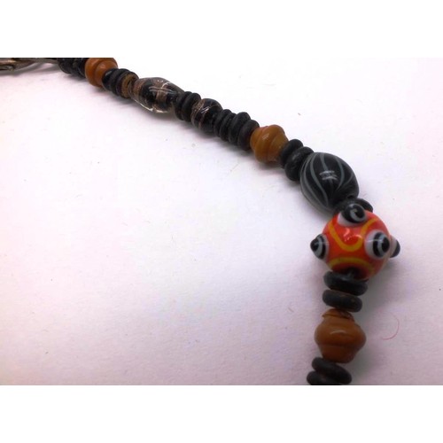 329 - VINTAGE BLACK AND ORANGE LAMPWORK GLASS BEAD NECKLACE APPROX LENGTH 18