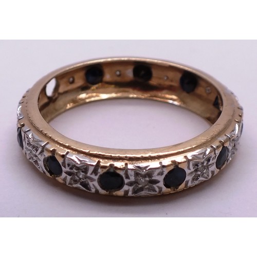 399 - 9 CARAT GOLD AND DIAMOND FULL ETERNITY RING- SIZE T- 3.25G