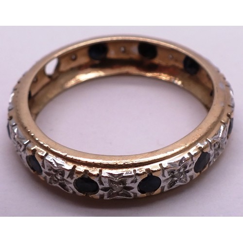 399 - 9 CARAT GOLD AND DIAMOND FULL ETERNITY RING- SIZE T- 3.25G