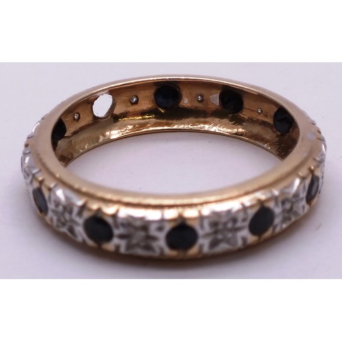 399 - 9 CARAT GOLD AND DIAMOND FULL ETERNITY RING- SIZE T- 3.25G